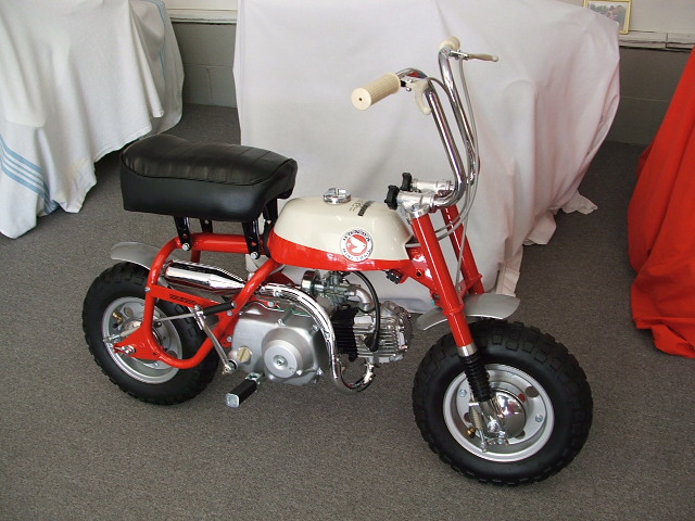 1968 Honda Z50 KO "Slant Guard"  
This bike was restored in 04'. It a early slant guard model. It is one of the first 1,000 built. Frame # 100992. Motor # 100988. It has the original Nitto tires and tubes, correct 8-panel seat, early high handlebars, original tank emblems (NOT REPRO!) NOS white grips (NOT REPRO!) NOS on/off switch and more. It was great to restore this bike to its past glory! It is the pride of my fleet. Has appeared in a few magazines. 
