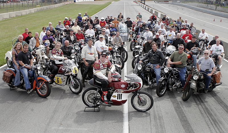 AMA Vintage Days,  85th Anniv. Parade Lap.  My 1970 Lady Dax was picked for the event.  Pictured on left side of photo.
You see me and the Dax - left side - about half-way back.
