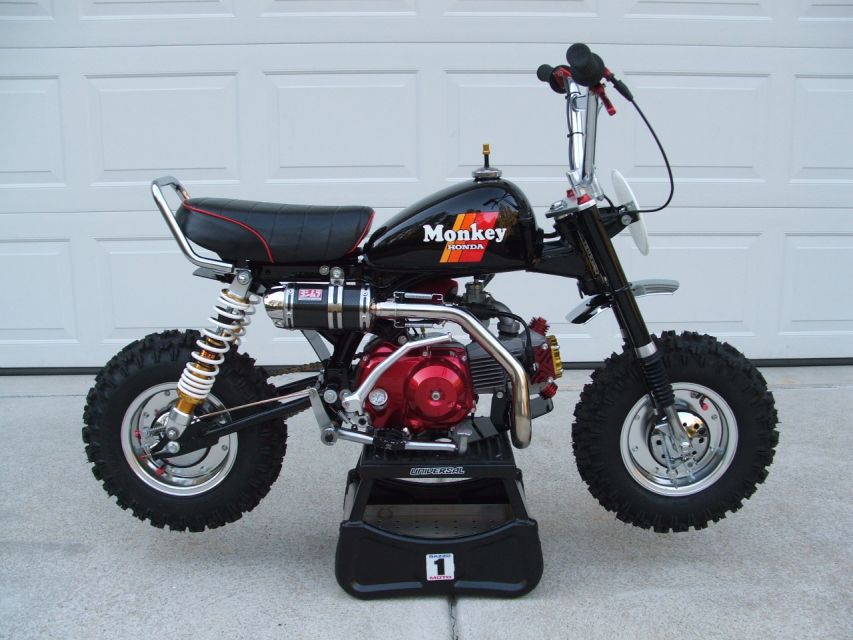 Custom 1982 Honda Z50R
Powdercoated Black metallic  frame-forks-swingarm.   Forks are 76' Z50.  Swingarm is a XR75.  NOS Honda Monkey Tank.  Motor is a Takagawa R' 88cc.  G-Craft wheels.  Fast50's Handlebar kit.  Lots of other little bits too.  Built this for my girlfriend.  
