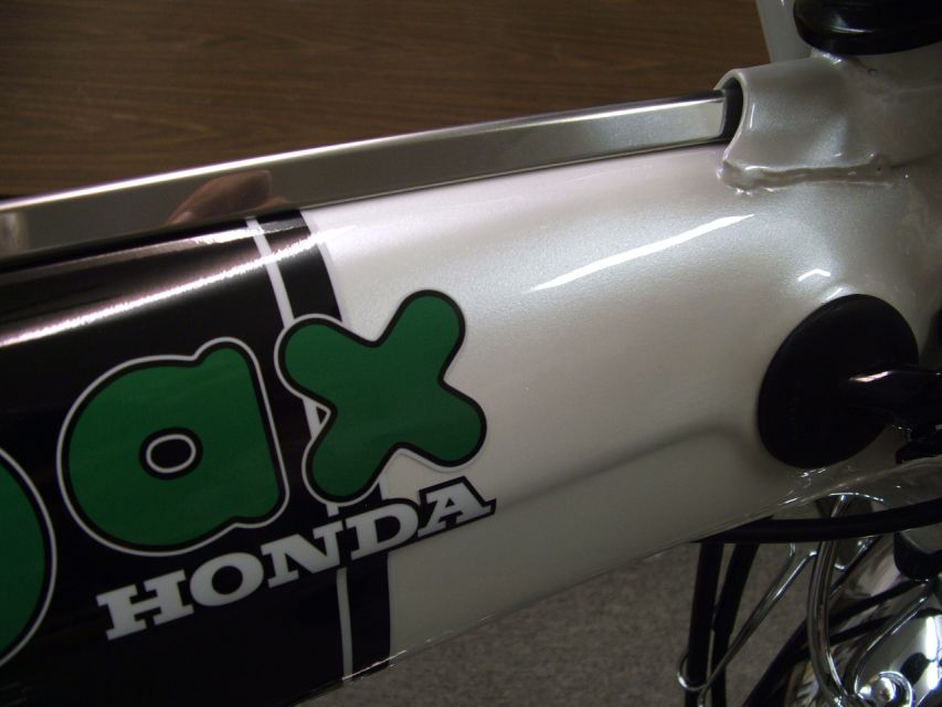 JDM Honda "White Dax" - White Pearl w/ micro green flake.
