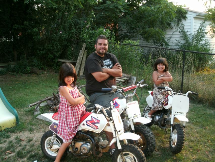 My friend Greg and his girls.  Starting them young!
